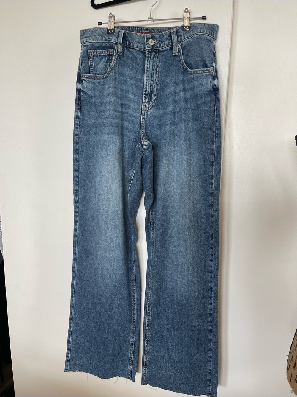 Lucky Brand Light Blue Denim Jeans with Red Logo Accent